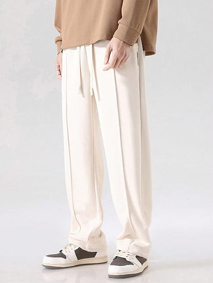 WHITE LOOSE FIT SIDE STRIPED TRACK PANTS FOR MEN